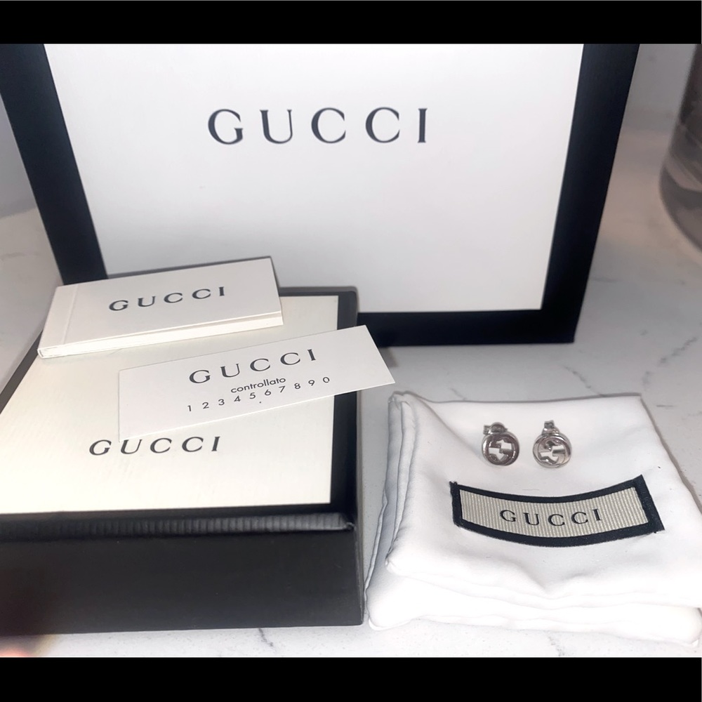 Gucci brand new never worn silver interlocking G